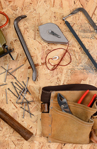 Image of an assortment of construction tools, Adobe Stock Image.